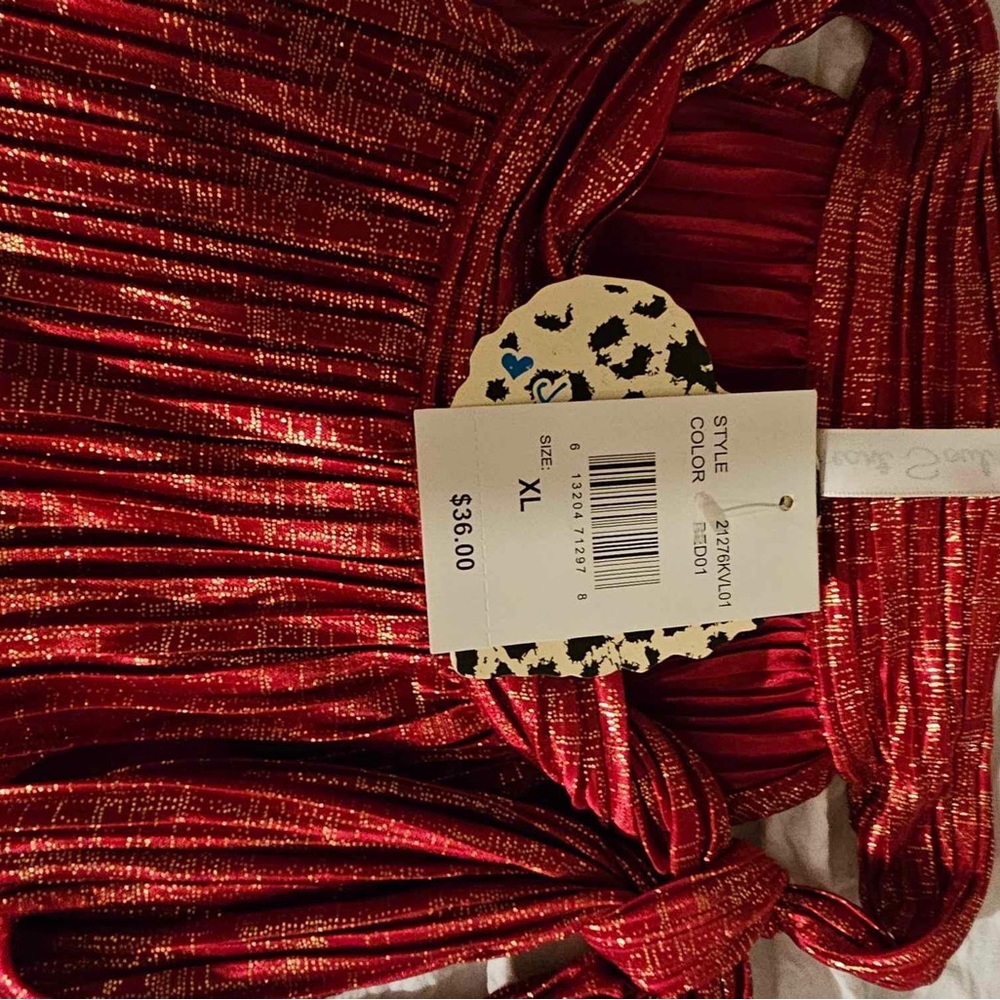 Red and gold sleeveless ladies top.